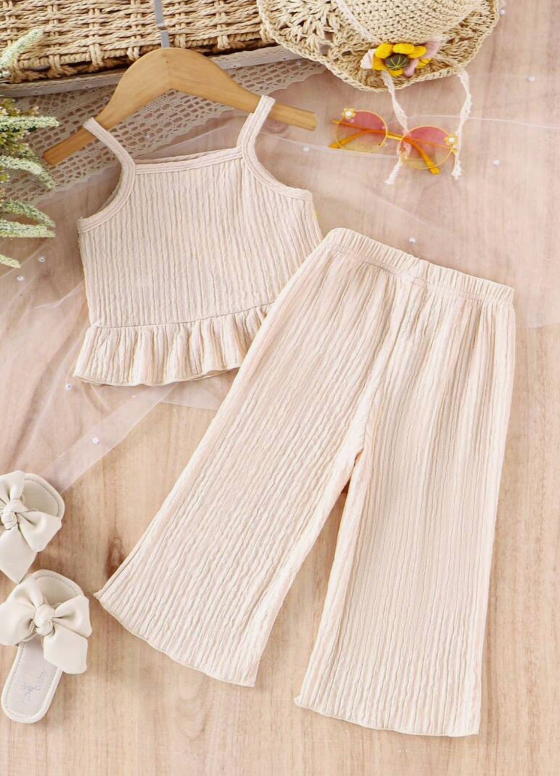 Conjunto de top de crochet tejido y pantalones casuales