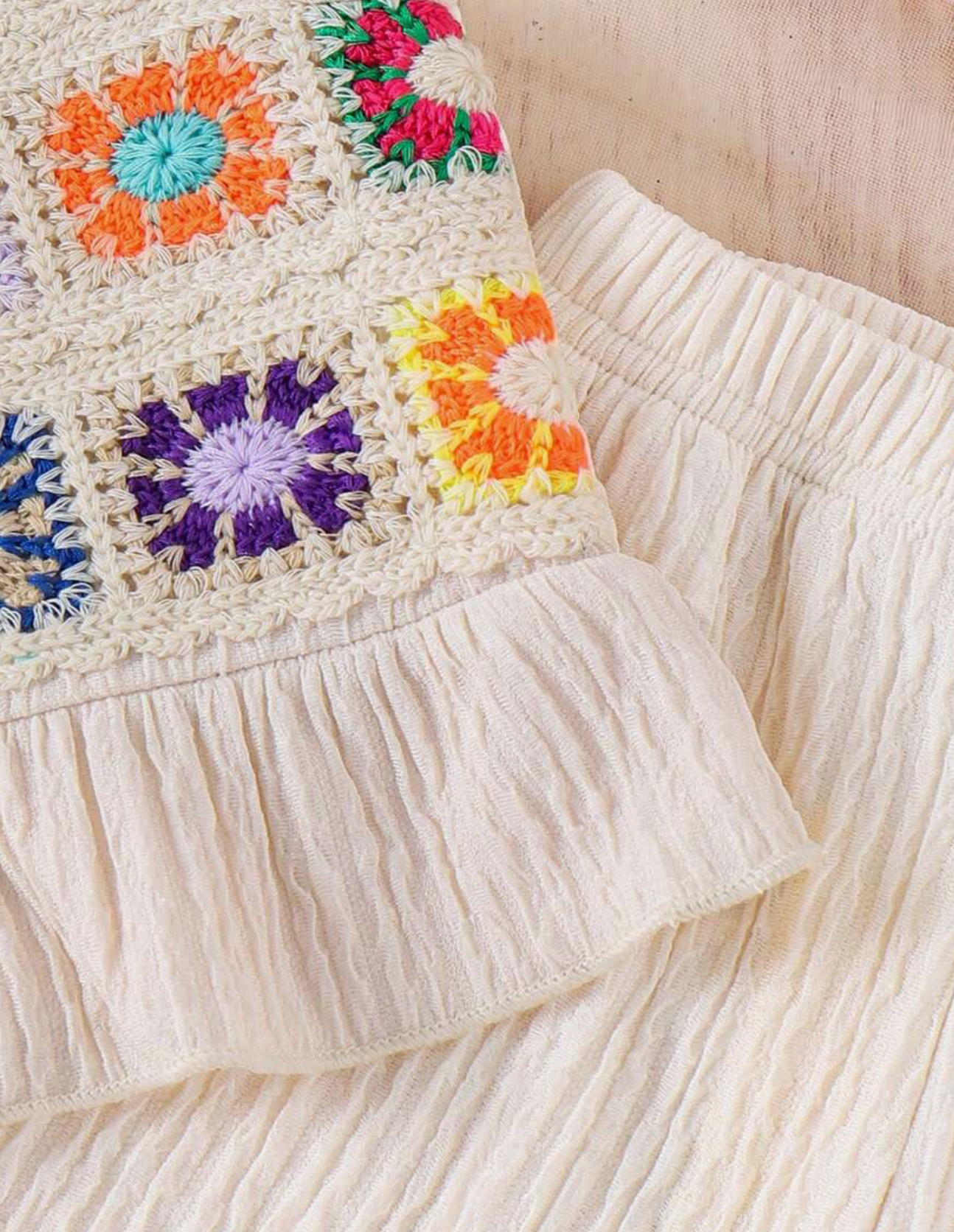 Conjunto de top de crochet tejido y pantalones casuales